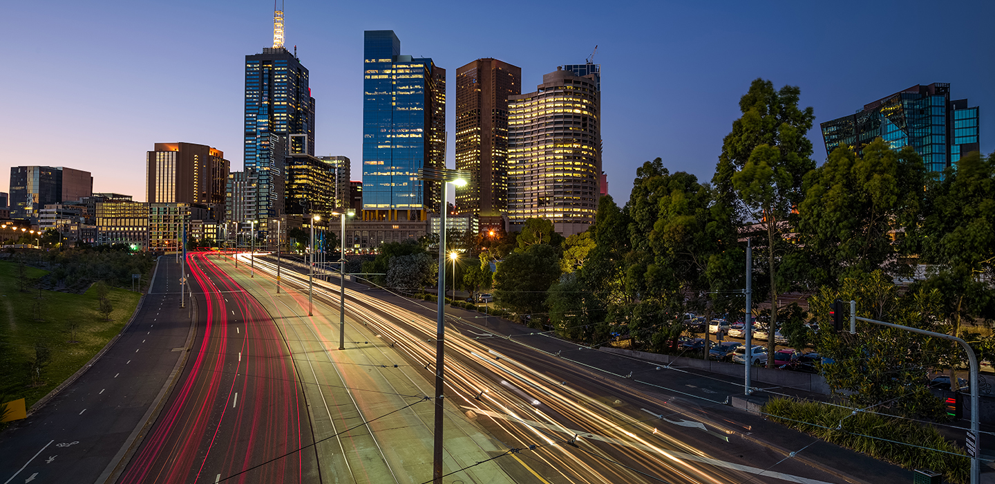 Fast moving cars on the roads in the city at night